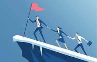 business people climbing mountain