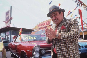 Car salesmen at an old dealership